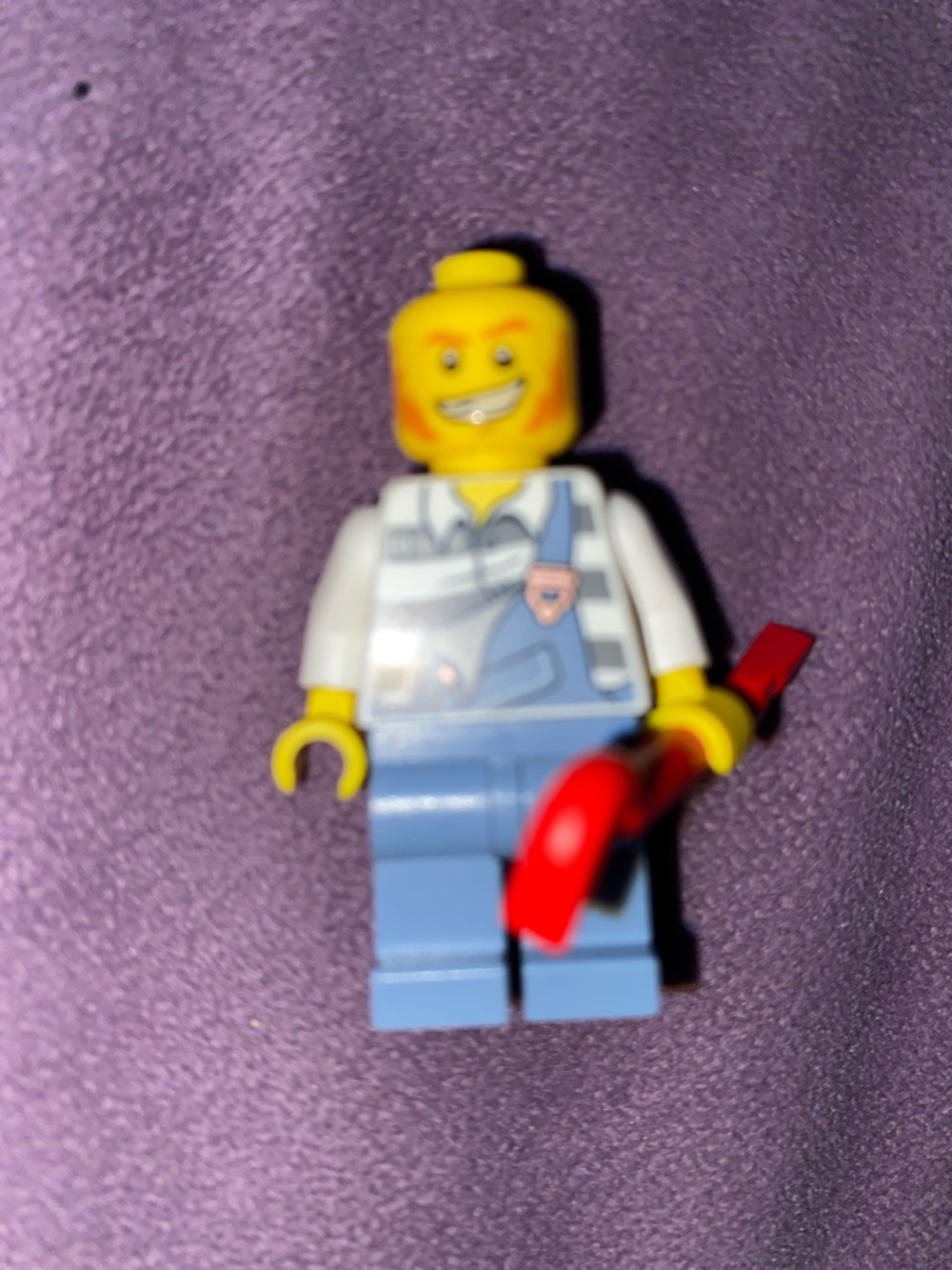 Lego Yellow Minifigure with Blue Overalls and Red Tool